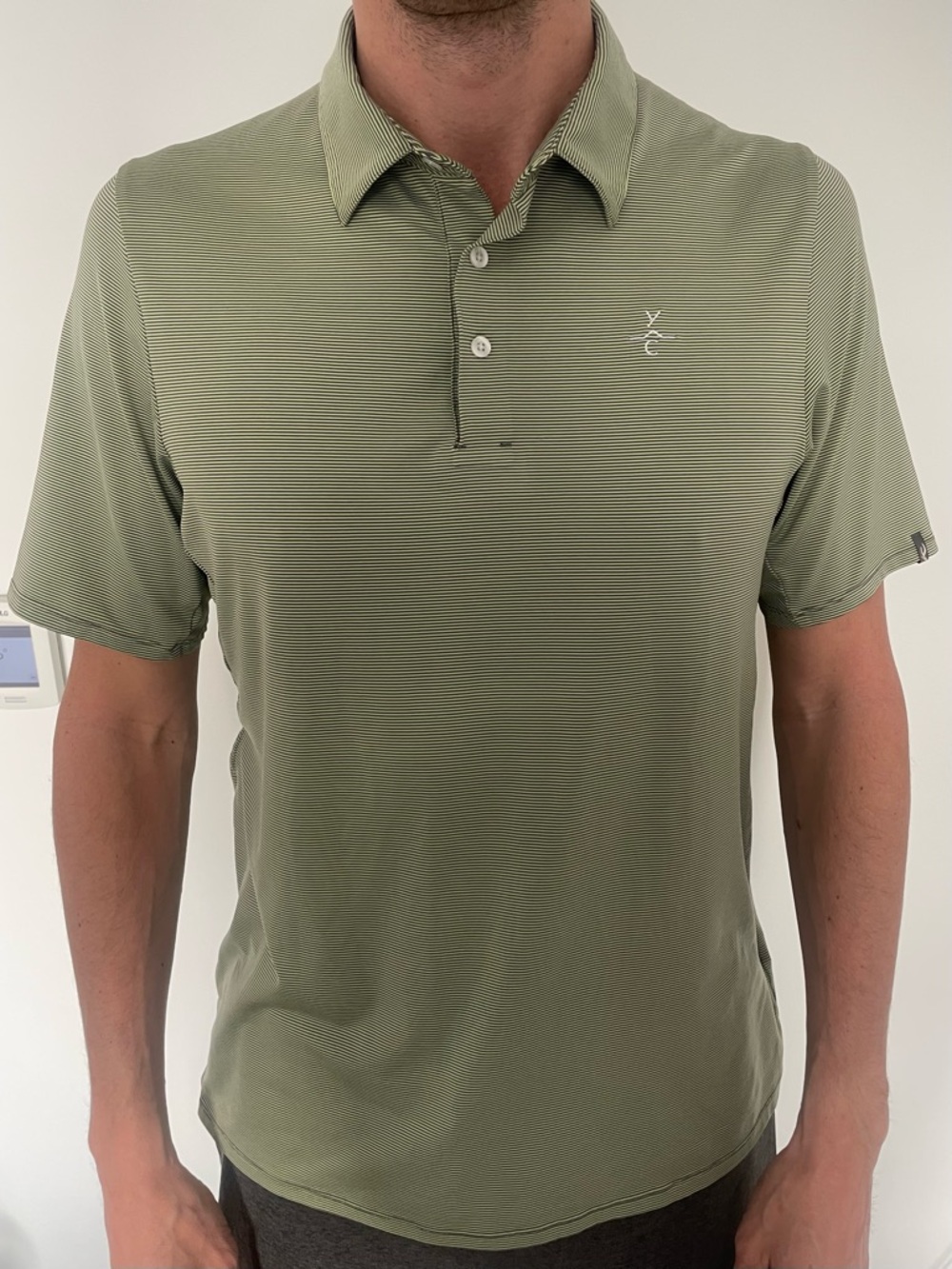 Kjus Soren Polo. Yellowstone Club logo.